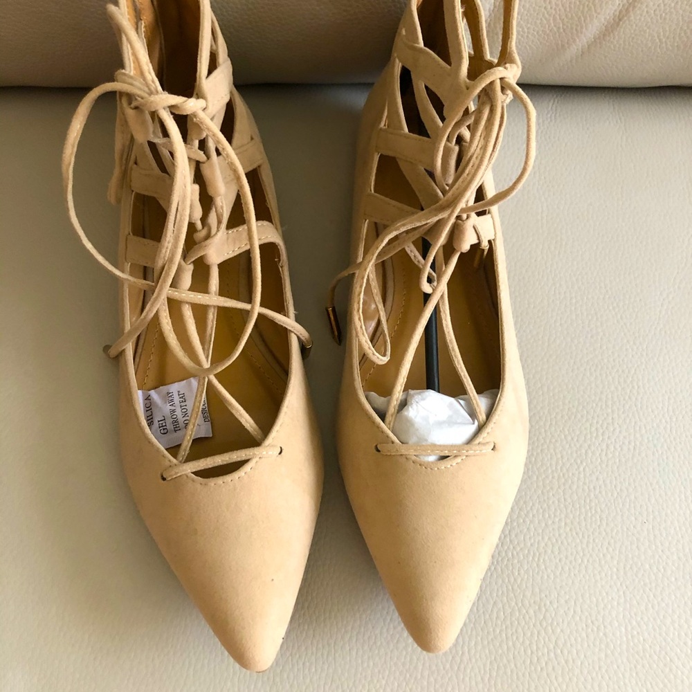 Beige pointed toe flat